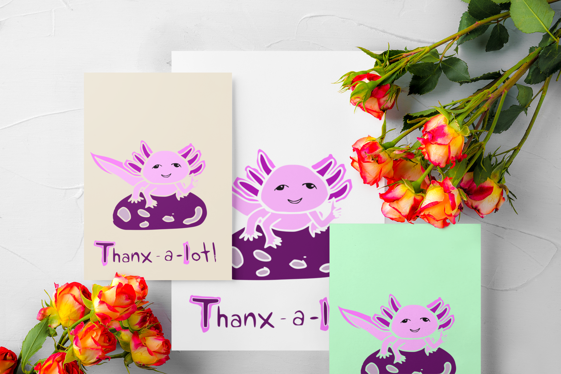 The “Thanxalotl” printable greeting card displayed in four print sizes — A5, A6, Half Letter, and 5x7 — on examples of A4 and US Letter paper.