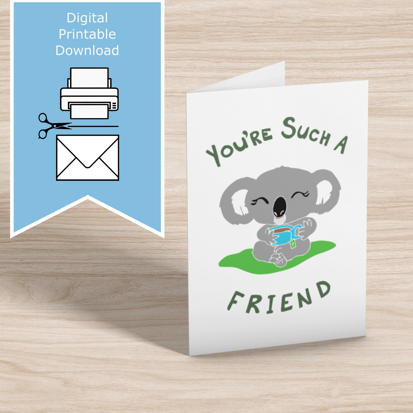 Hand-drawn printable greeting card with a cute koala holding a cup of tea and the pun “You’re Such a Koala Tea Friend.”